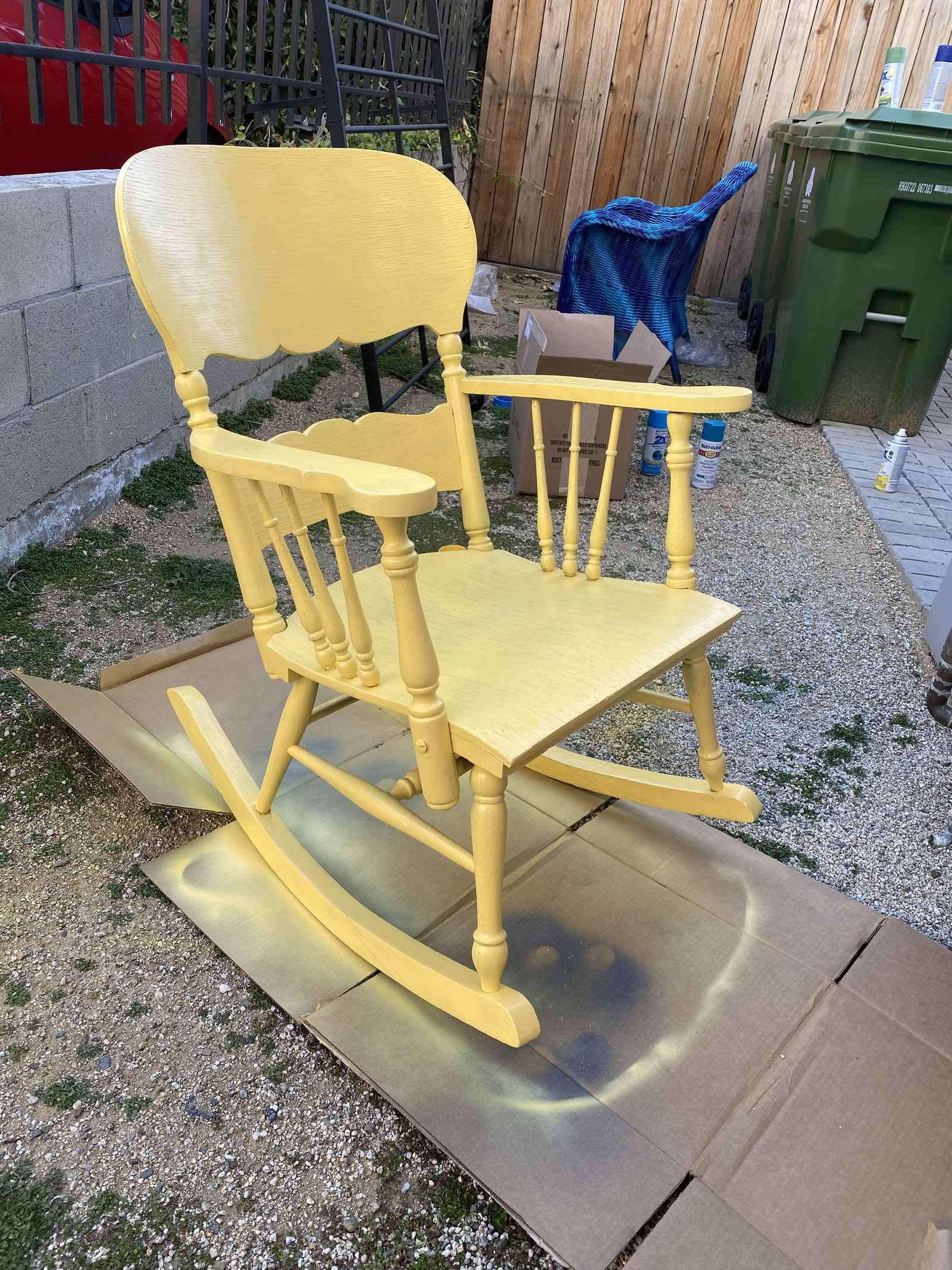 A rocking chair painted yellow for Goodnight Moon