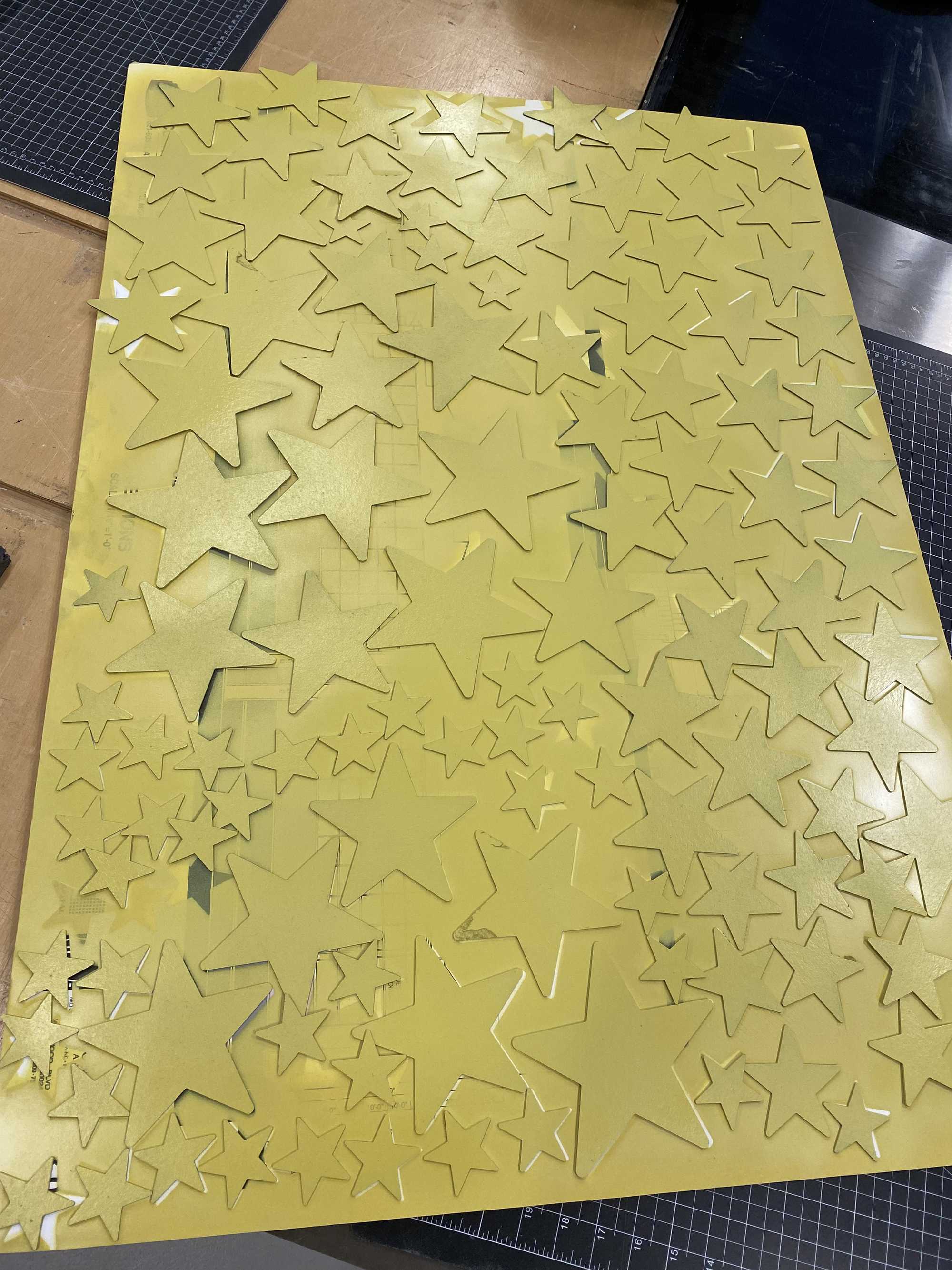 Cut-out stars, sanded and painted